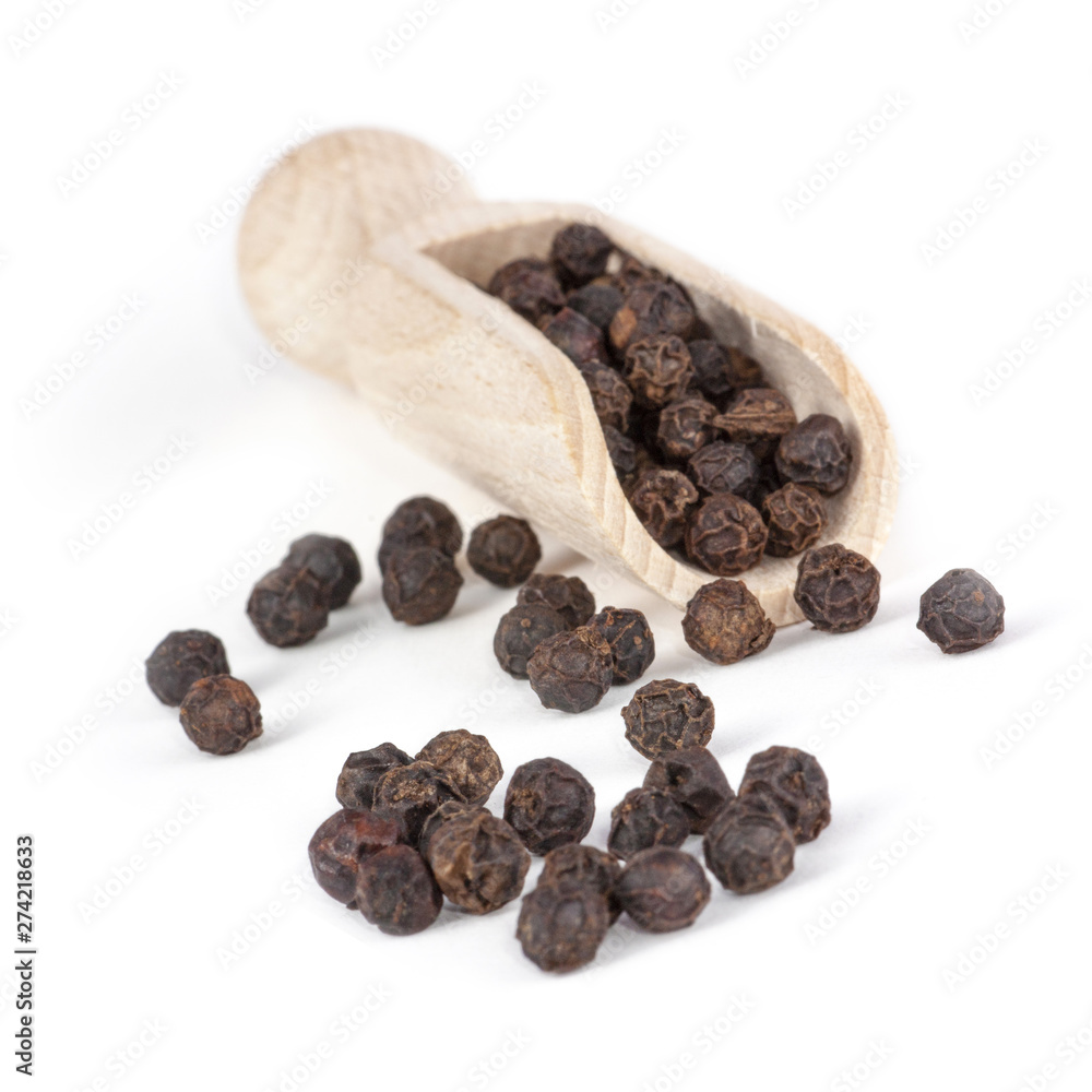 Black Pepper in wooden shovel. Isolated on white background. Black Pepper in wooden shovel. Isolated on white background.