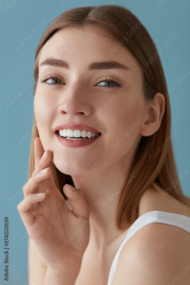 Beauty portrait of smiling woman with white teeth smile Beauty portrait of smiling woman with white teeth smile