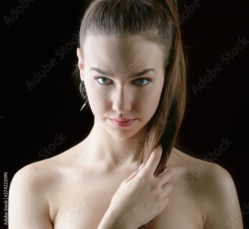 Portrait of beautiful sensual woman, close-up. Studio shot.