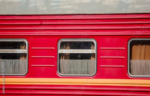 Three Windows of the red sleeping car.