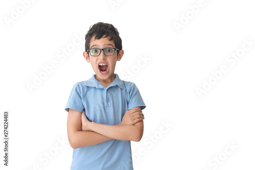 Surprised boy in spectacles and t-shirt. Isolated over white background. Schoolboy. Teenager. © vik_li