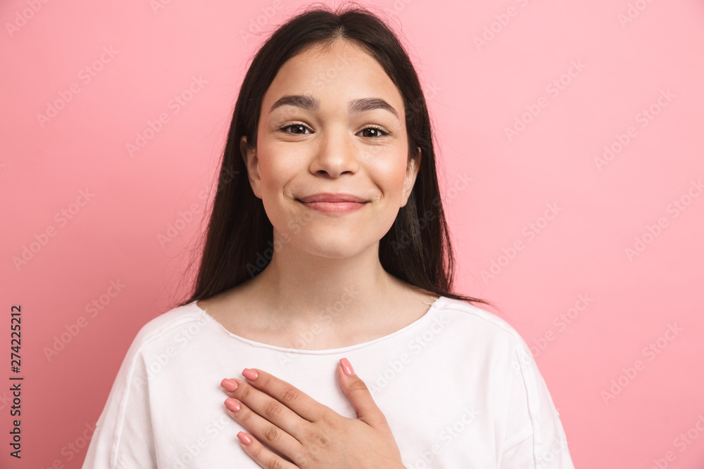 Portrait closeup of gorgeous happy girl with long dark hair looking and smiling at camera Portrait closeup of gorgeous happy girl with long dark hair looking and smiling at camera