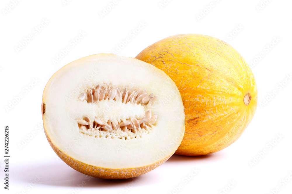 Fresh ripe melon isolated on white background. A piece of melon cut in half. Fresh ripe melon isolated on white background. A piece of melon cut in half.