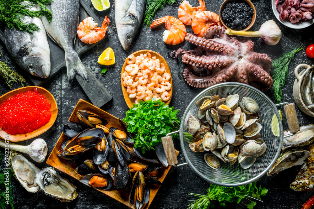 Healthy diet food. A variety of fresh seafood. - obrazy, fototapety, plakaty 