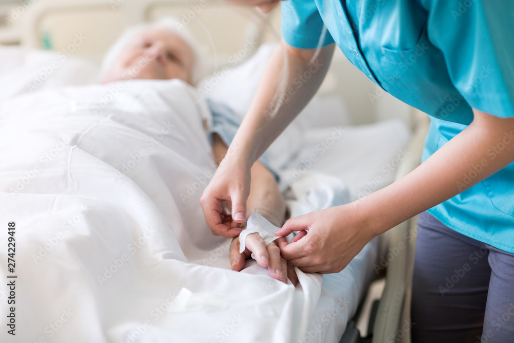 Senior patient and nurse in hospital Senior patient and nurse in hospital