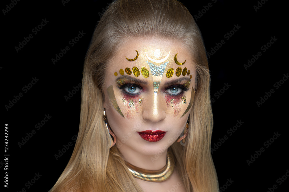 New creative make-up, conceptual idea for Halloween golden woman