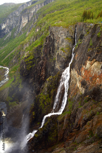 bjoreio river fills the voringfossen in the green norway, voringfossen waterfalls in hardanger eidfjord view from the top a big tourist attraction in norway