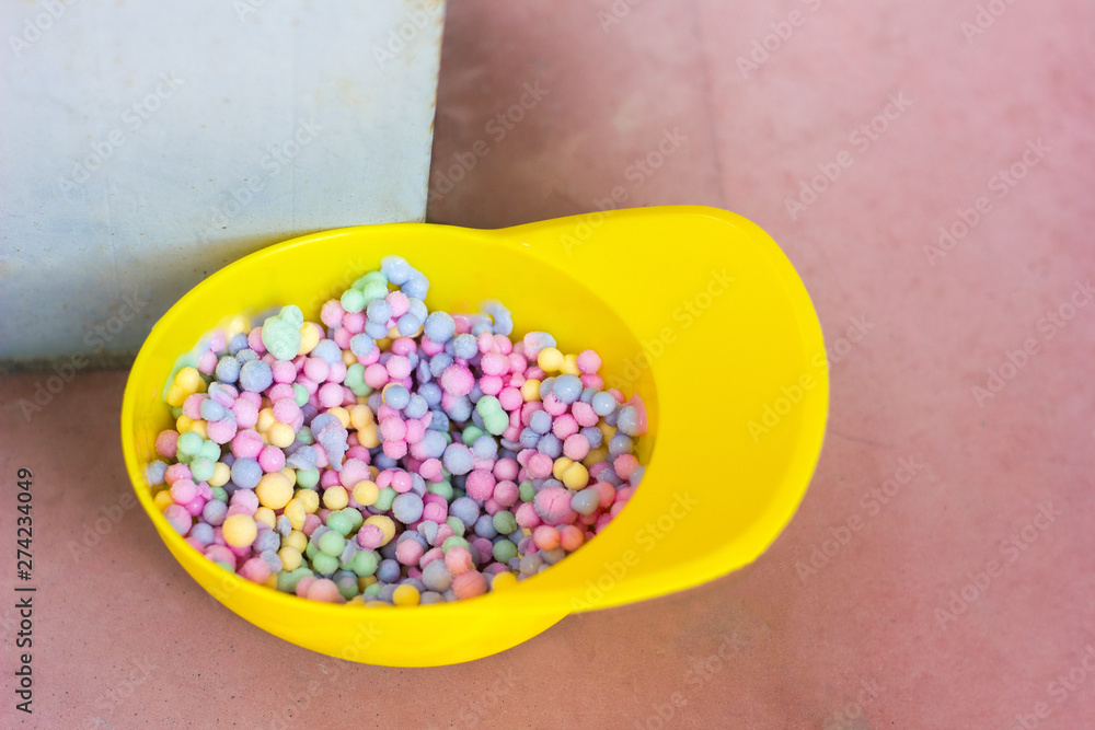 ice cream mini melts small balls, multi-colored ice balls, summer concept,  refreshment in summer Stock Photo | Adobe Stock