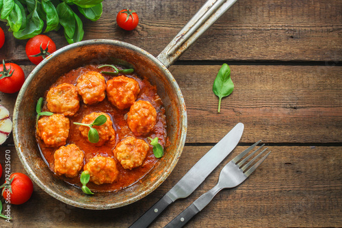 meatballs in tomato sauce (meat dish). food background. top view. copy space