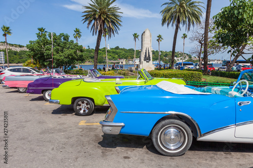 Cuba, Havana. Old classic American cars, used as Taxi, parked next to popular tourist atractions at old part of the city. © Romas Vysniauskas