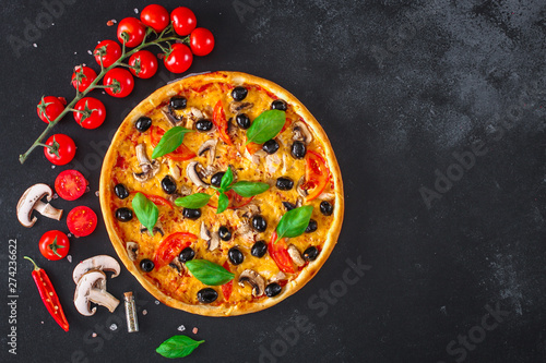 pizza, mushrooms, olives, chicken, tomato sauce, cheese (pizza ingredients). hot pizza. Top view. copy space