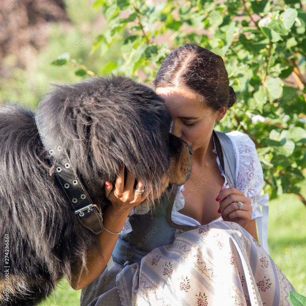 girl holding a dog girl holding a dog