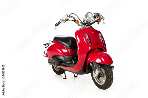 clean, new, red scooter isolated on white © LIGHTFIELD STUDIOS