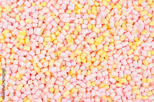 Marshmallow. Background of pink and yellow colorful mini marshmallows.
