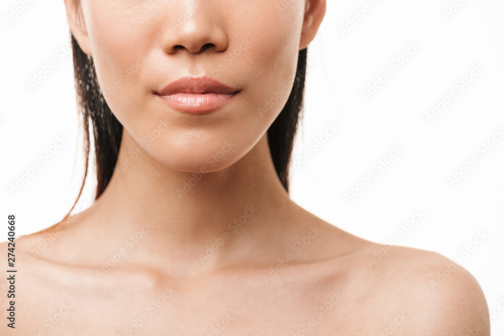 Asian young pretty woman with healthy skin posing isolated over white wall background. Asian young pretty woman with healthy skin posing isolated over white wall background.