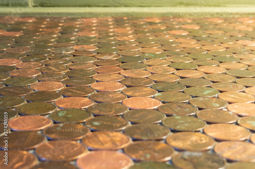 Flat Lay of Pennies from Diminishing Perspective View