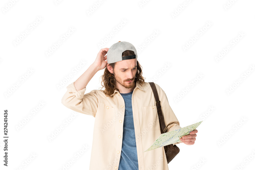 confused young man holding map isolated on white confused young man holding map isolated on white