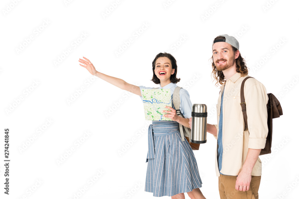 young man standing and holding thermos while girl outstretching hand and holding map isolated on white