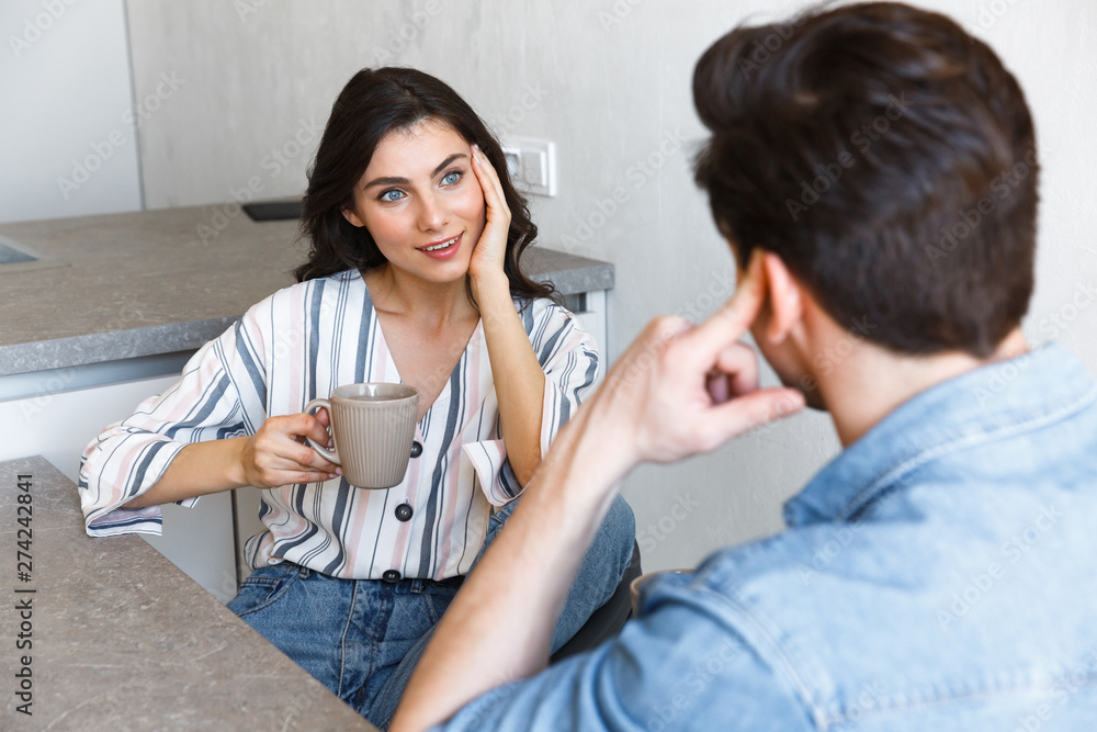 Attractive young couple drinking coffee Attractive young couple drinking coffee