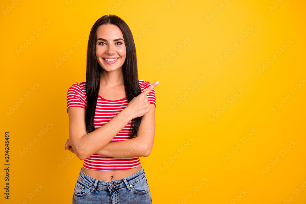 Portrait of lovely attractive teen teenager student promoter look adverts advertise wear denim jeans modern clothing isolated vibrant yellow background Portrait of lovely attractive teen teenager student promoter look adverts advertise wear denim jeans modern clothing isolated vibrant yellow background