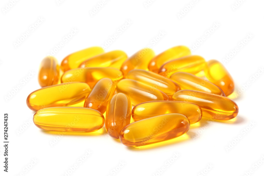 Omega-3 capsules on a white background. Fish oil, healthy supplements Omega-3 capsules on a white background. Fish oil, healthy supplements