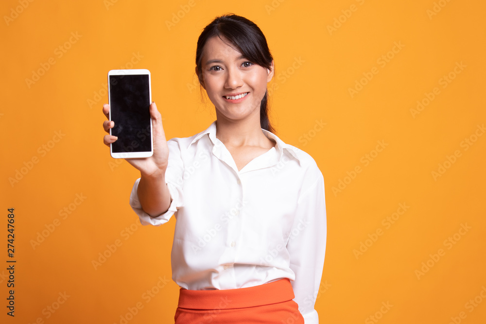 Young Asian woman with mobile phone. Young Asian woman with mobile phone.