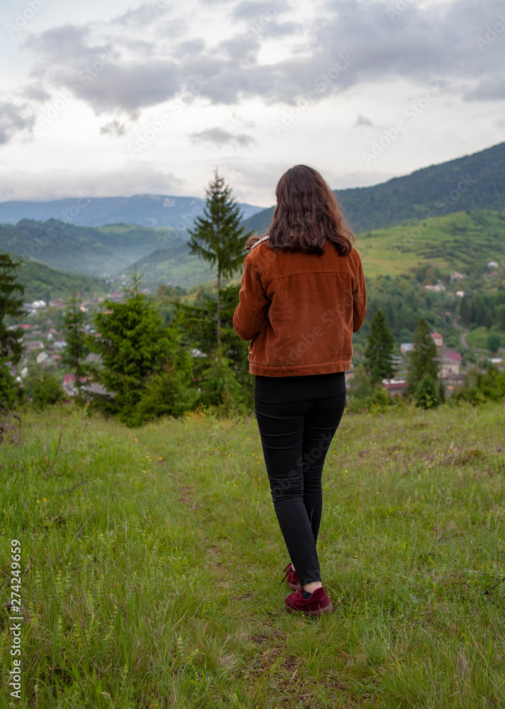 woman walking in mountains
