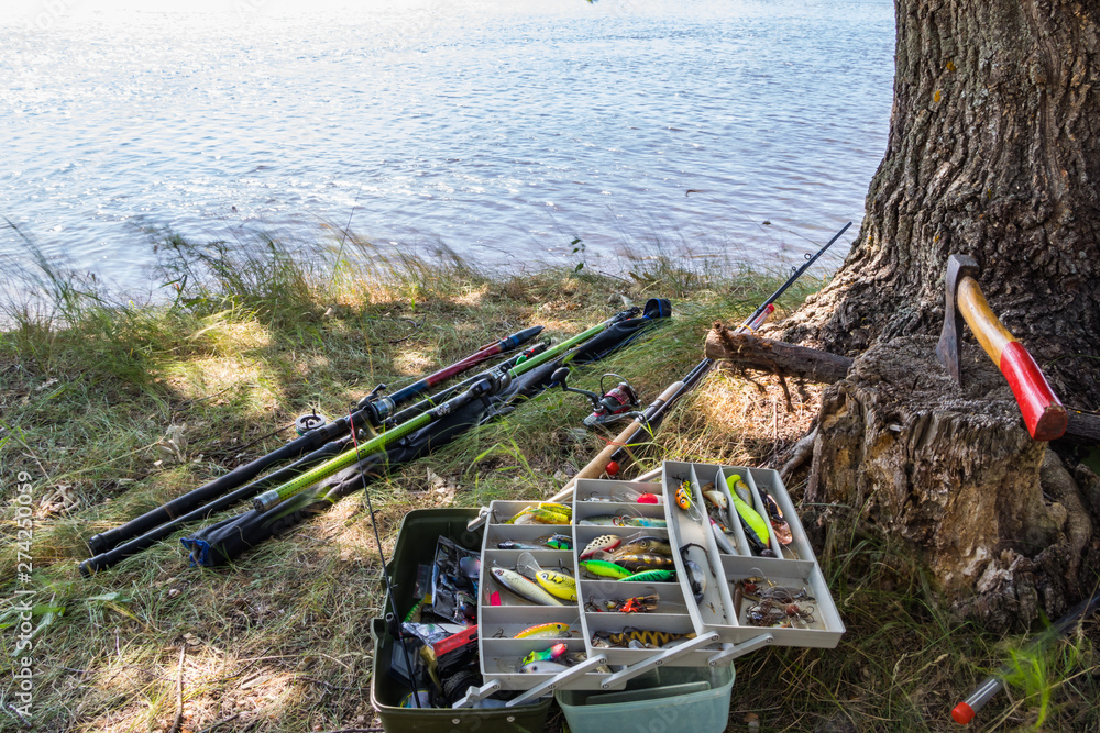 Fishing tackle for catching predatory fish on the river bank in summer Fishing tackle for catching predatory fish on the river bank in summer