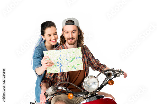 beautiful girl showing map to young man and sitting on red scooter isolated on white