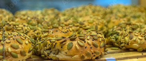 a bun sprinkled with seeds photo