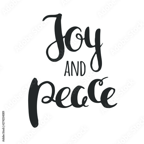 Christmas wishes of joy and peace handwritten in calligraphy. Christmas lettering isolated on white.