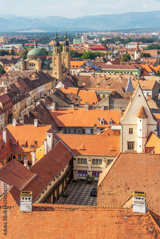 Sibiu elevated cityscape with Holy Trinity Cathedral seen from the steeple of the Lutheran Cathedral of Saint Mary