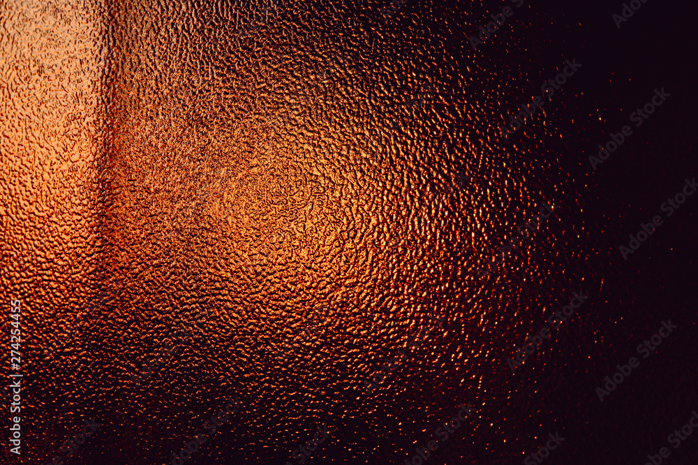 Sunset sun behind grainy glass. Indoor. Texture. Sunset sun behind grainy glass. Indoor. Texture.