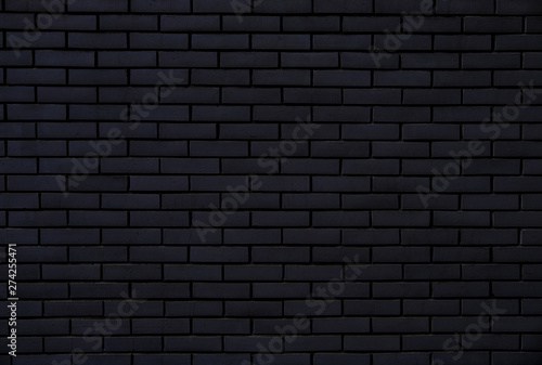 Black brick wall for background and texture.-Image