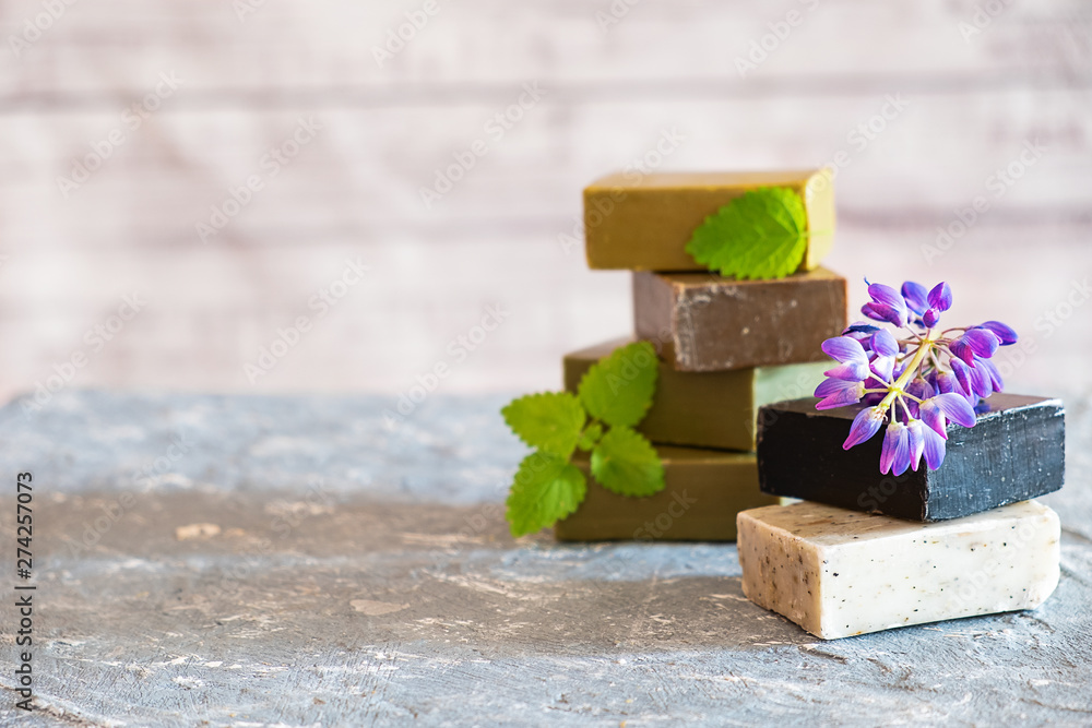 Pieces of natural soap made with your hands on the table close-up with space for text. Hobbies of modern man Pieces of natural soap made with your hands on the table close-up with space for text. Hobbies of modern man