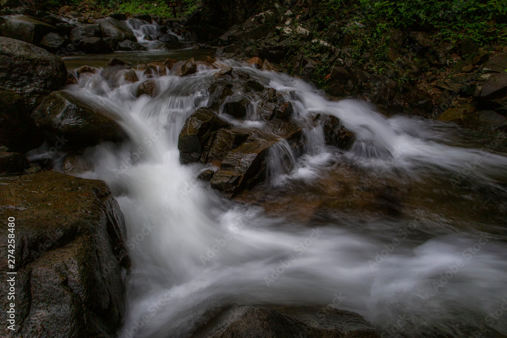 Namtok Phlio consists of two streams that join together and flow through rocks and high cliffs and turn out to be a beautiful waterfall with clear water. Namtok Phlio consists of two streams that join together and flow through rocks and high cliffs and turn out to be a beautiful waterfall with clear water.