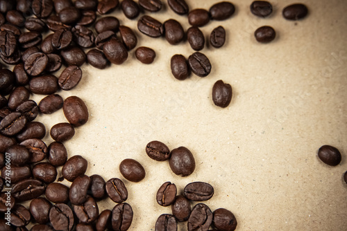 Closeup group of coffee bean on background blurry light around