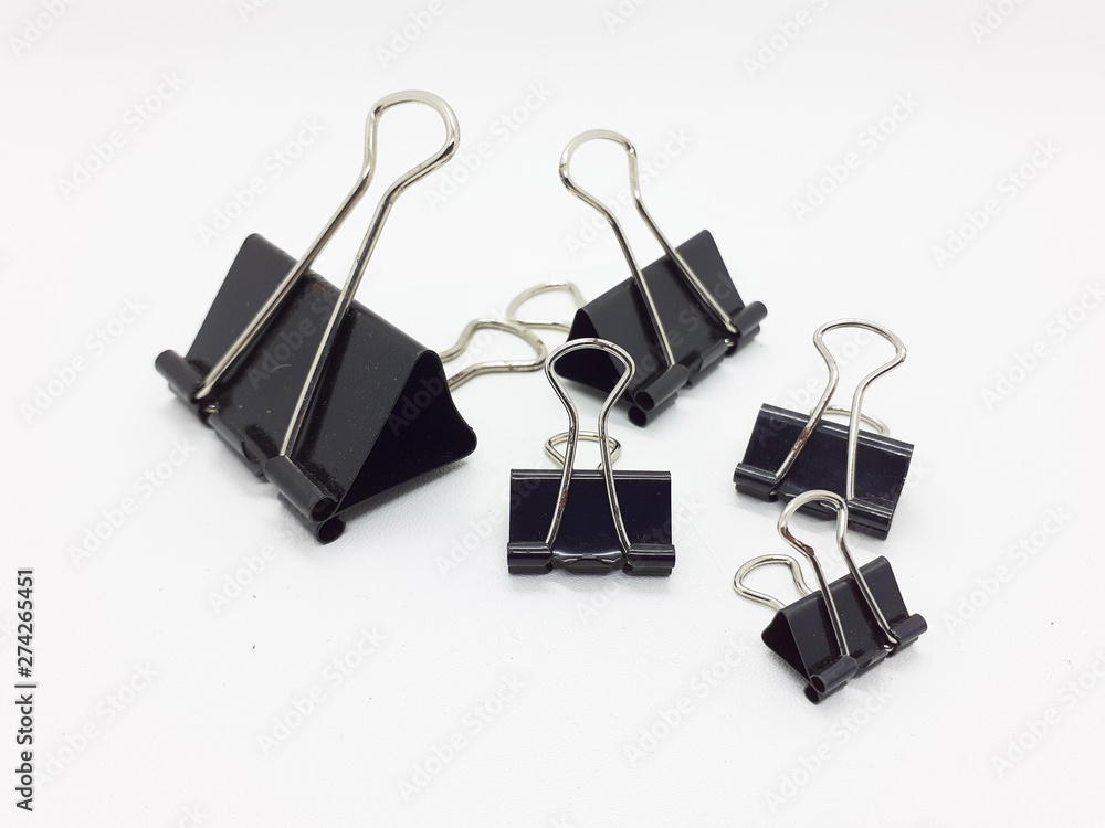 Black Paper Clipper with Various Size for Office in White Isolated Background Black Paper Clipper with Various Size for Office in White Isolated Background