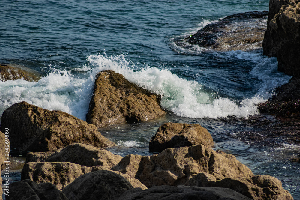 waves crashing on rocks waves crashing on rocks