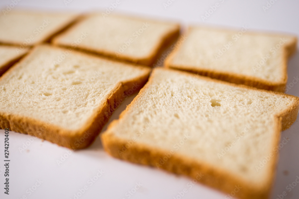 slices of bread on white background