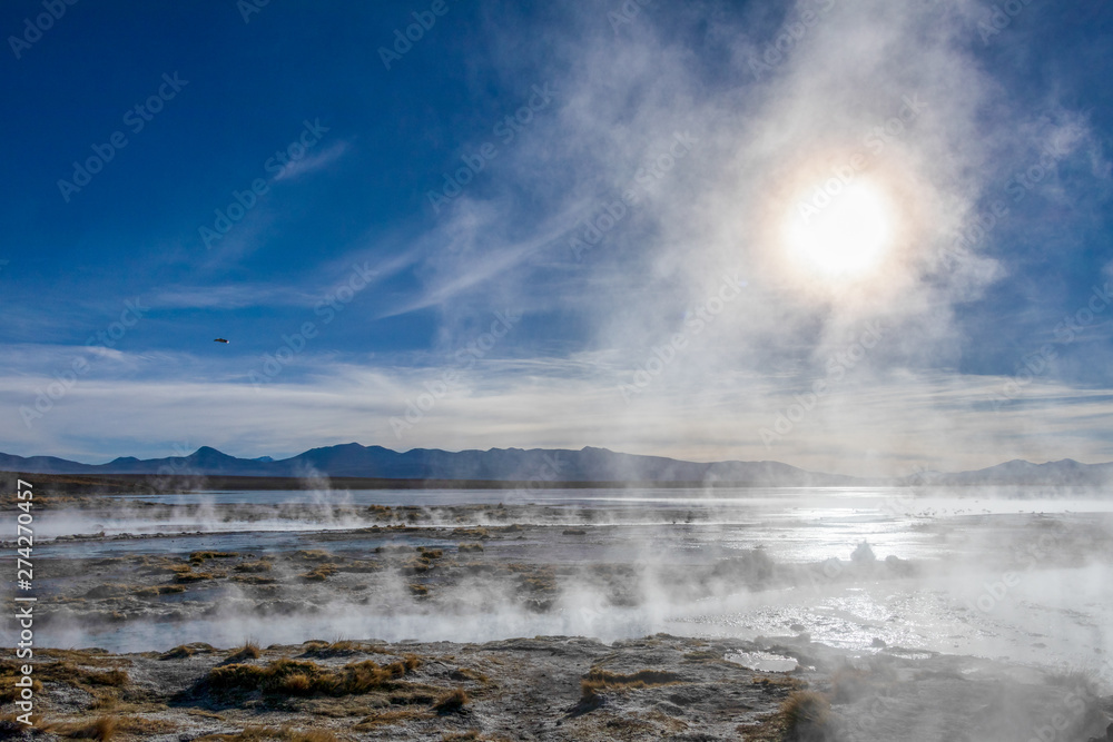 Aguas termales de Polques, hot springs with a pool of steaming natural thermal water in Bolivia Aguas termales de Polques, hot springs with a pool of steaming natural thermal water in Bolivia