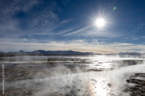 Aguas termales de Polques, hot springs with a pool of steaming natural thermal water in Bolivia © nomadkate