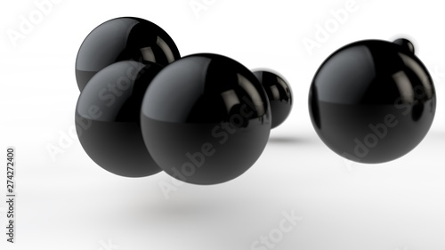 3D illustration of large and small black balls, spheres, geometric shapes isolated on a white background. Abstract, futuristic, the image of objects of ideal form. 3D rendering of the idea of order