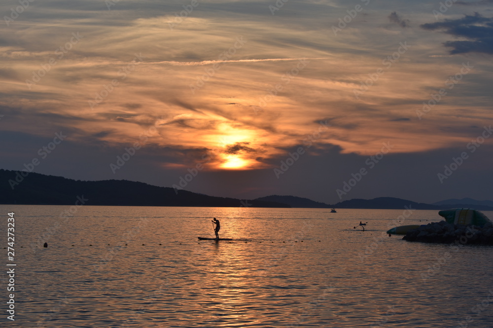 Paddle Boarding into the Sunset