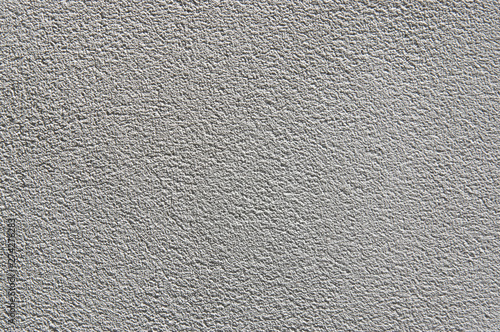  gray plaster on the insulated walls of the facade