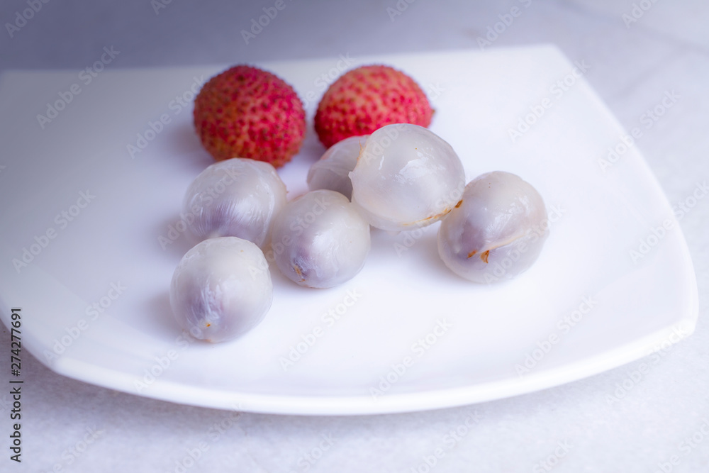 Advertising with lychee. Tropical fruit. Organic nutrition. Fresh fruit. Healthy drink. Sweet dessert. Healthy vegetarian food. Juice background. Summer, sweet food. Healthy diet. Vegetarian nutrition Advertising with lychee. Tropical fruit. Organic nutrition. Fresh fruit. Healthy drink. Sweet dessert. Healthy vegetarian food. Juice background. Summer, sweet food. Healthy diet. Vegetarian nutrition