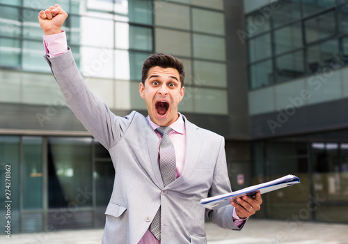 Businessman expressing satisfaction