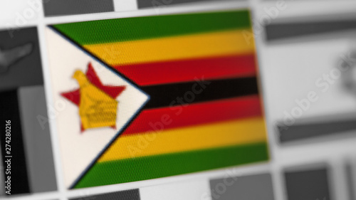 Zimbabwe national flag of country. Zimbabwe flag on the display  a digital moire effect.
