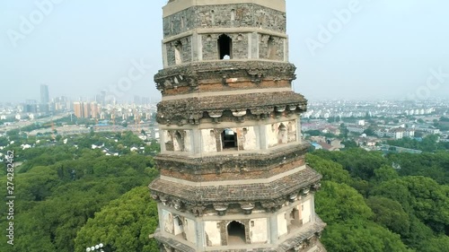 Aerial view of leaning Yunyan pagoda of Tiger Hill. It is a tourist destination and is known for its natural environment and historic sites. Suzhou, China photo