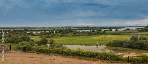  meadows and floodplain before a thunderstorm